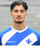 Arslan E.